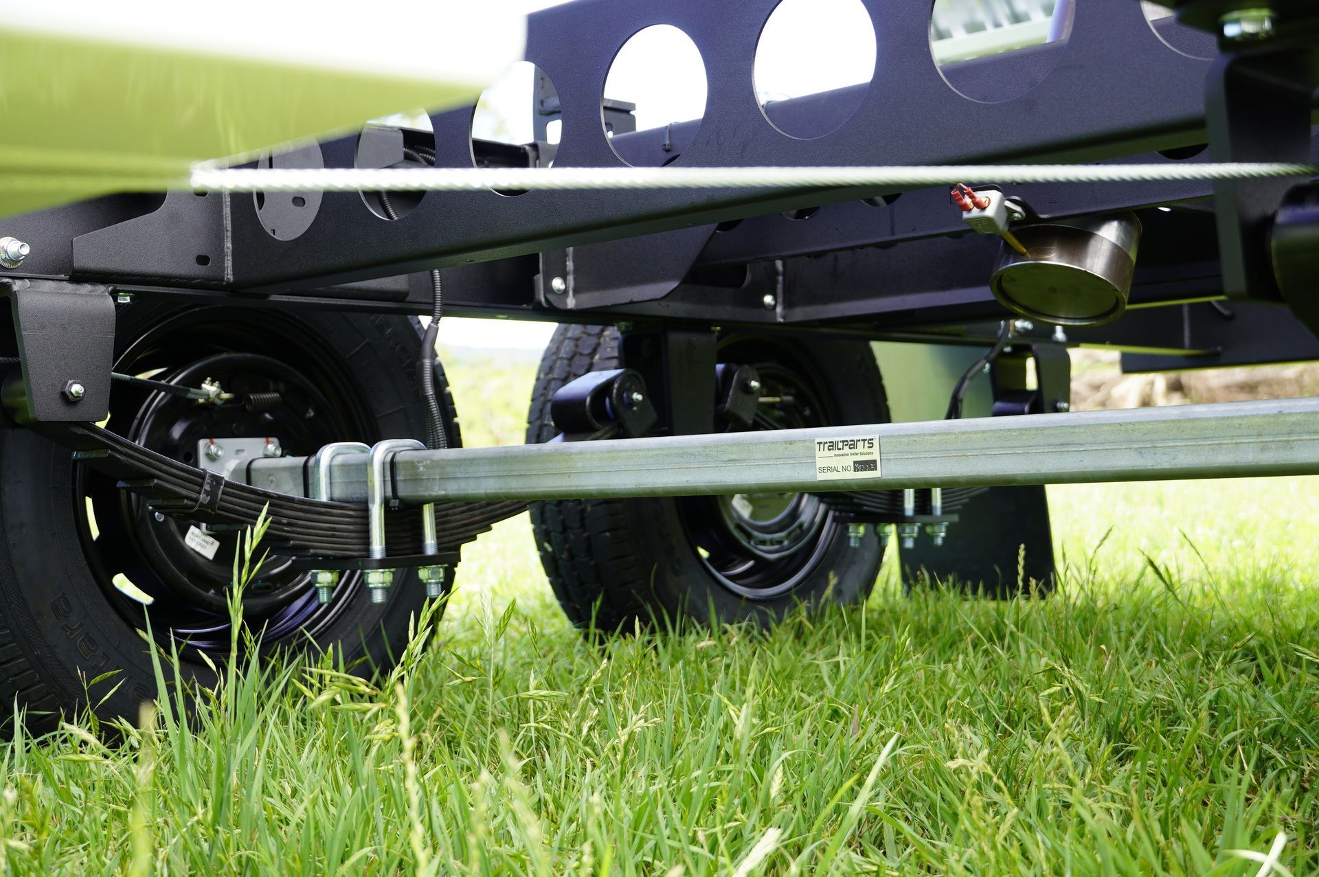 Load Sharing Leaf Spring Suspension Set on an Ox Trailer