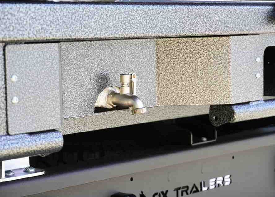 Two Aluminium Undertray water tanks installed on the rear of a flat top trailer.