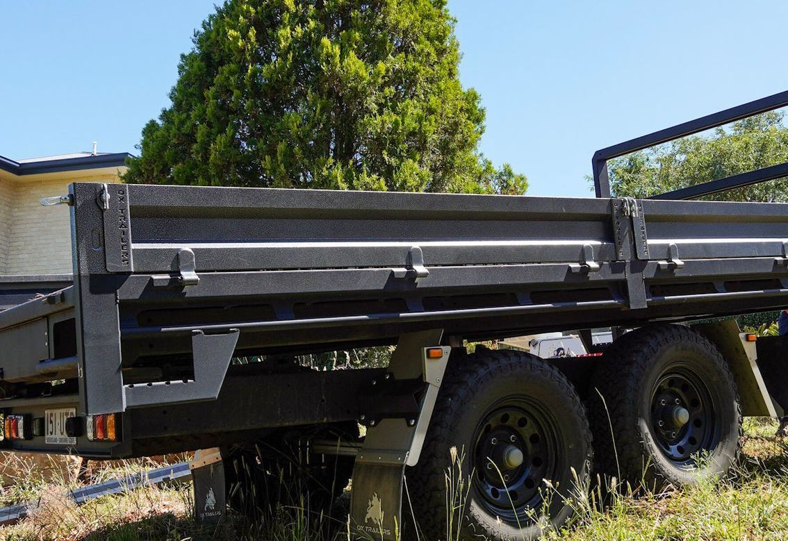 The Aztec silver dropsides of Vortec Globals rear tipper trailer.