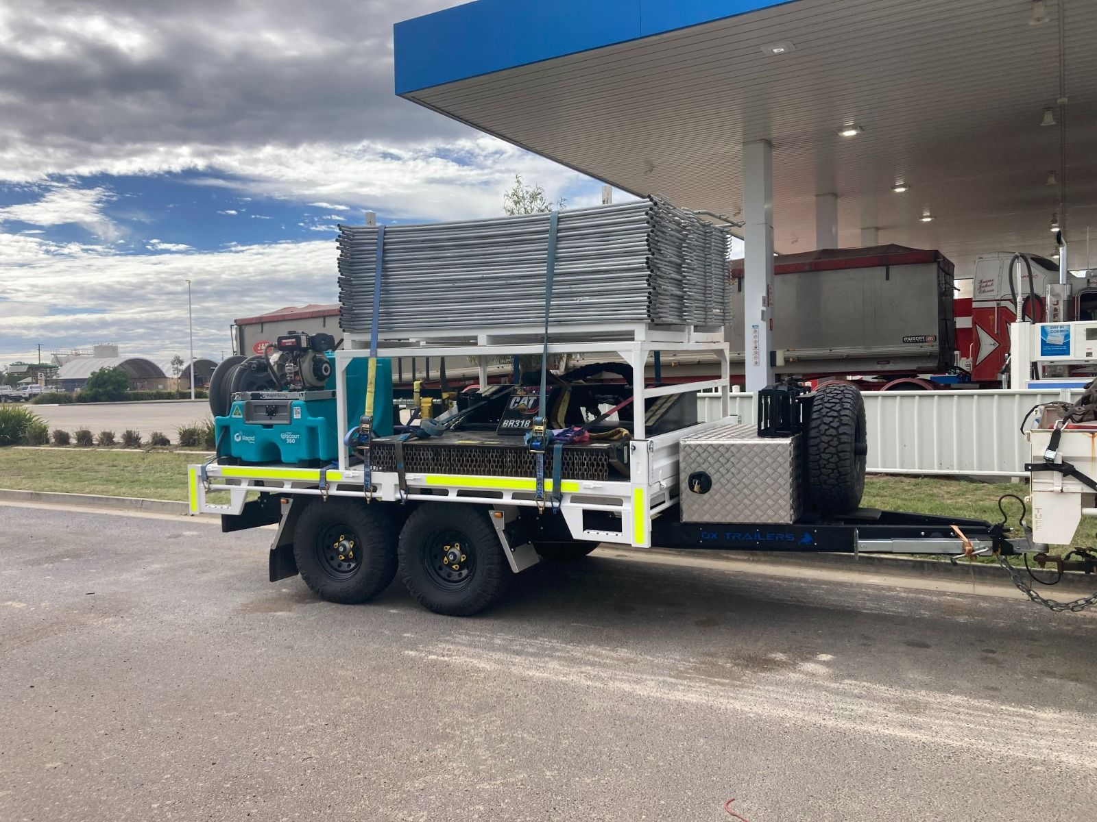 The monster hire flat top trailer with reflective tape and drawbar toolbox