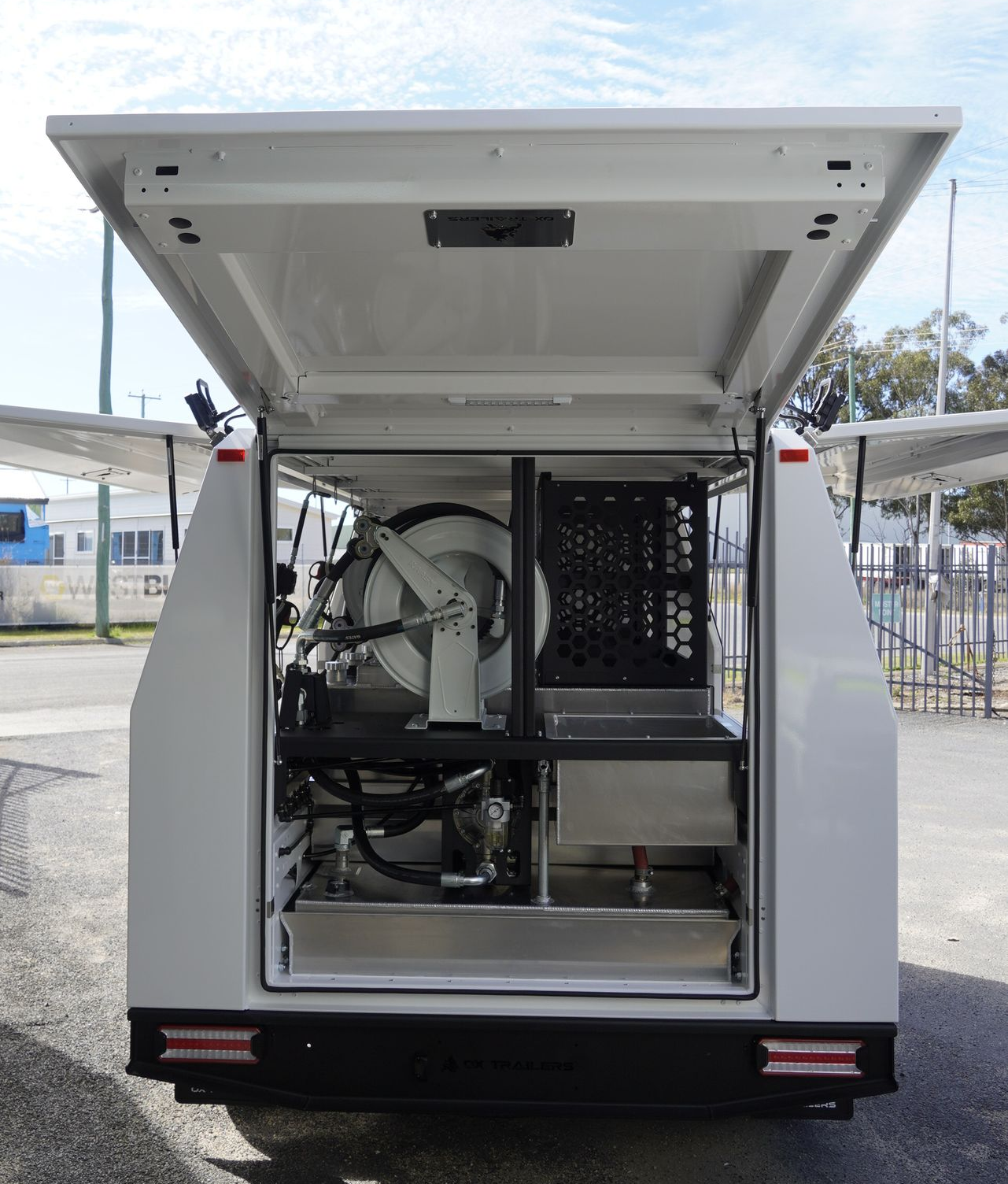 Durable ox trailers rear door of australian made service trailer for equipment access on mine sites.