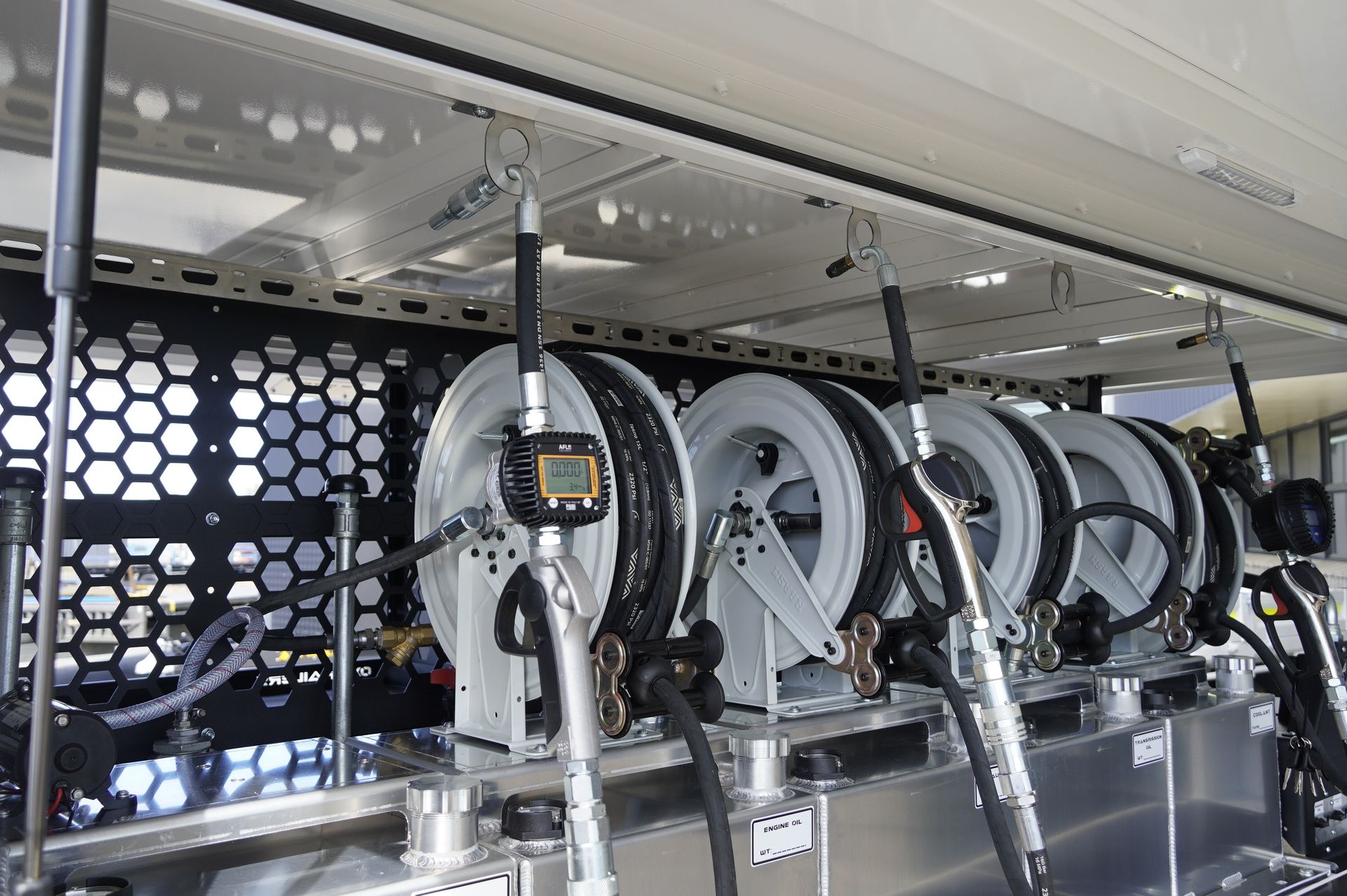 Aflo pums, reels and hand pieces installed in ox trailers service trailer.