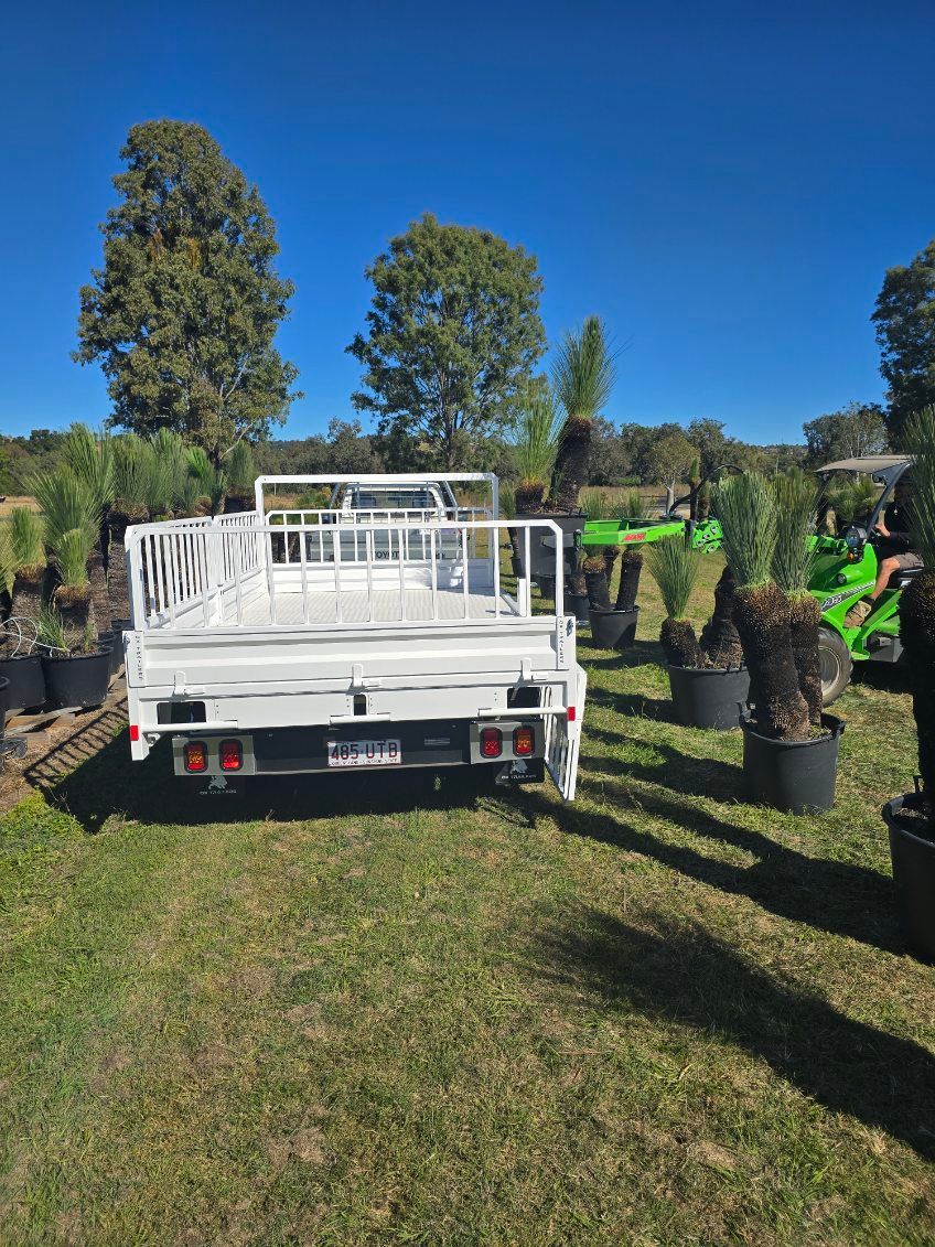 The Station Creek Tree Farm Flat Top Trailer being loaded with native Australian plants for export.