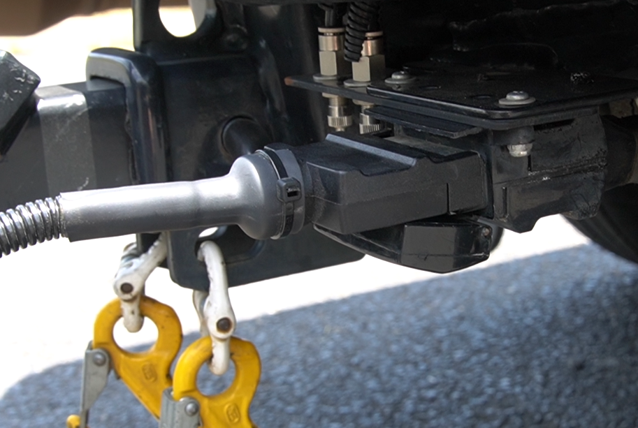 Installing trailer plug into tow vehicle.