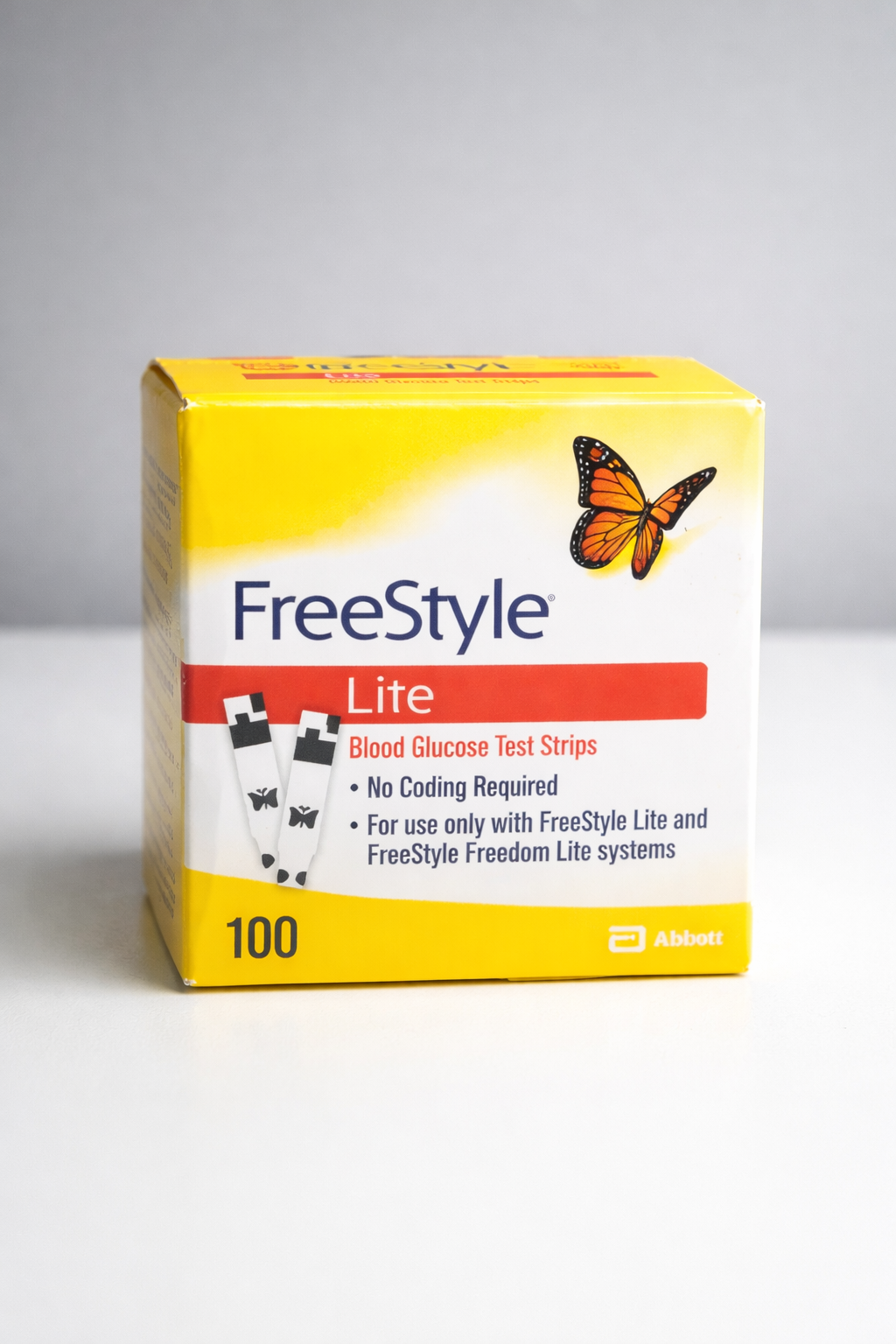 Box of FreeStyle Lite blood glucose test strips; yellow, orange, and white.