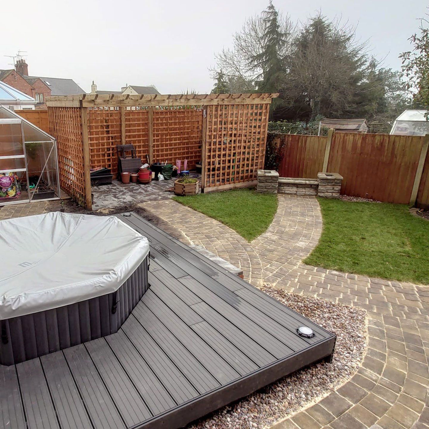 Zest Decking Coventry - brown composite decking fitted around a hot tub
