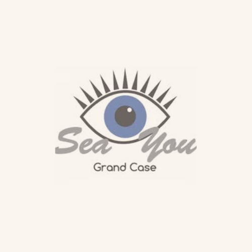 A logo for a company called sea you grand case.