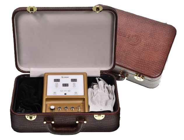 A brown briefcase with a Bioenergetic Meridians Massager inside of it