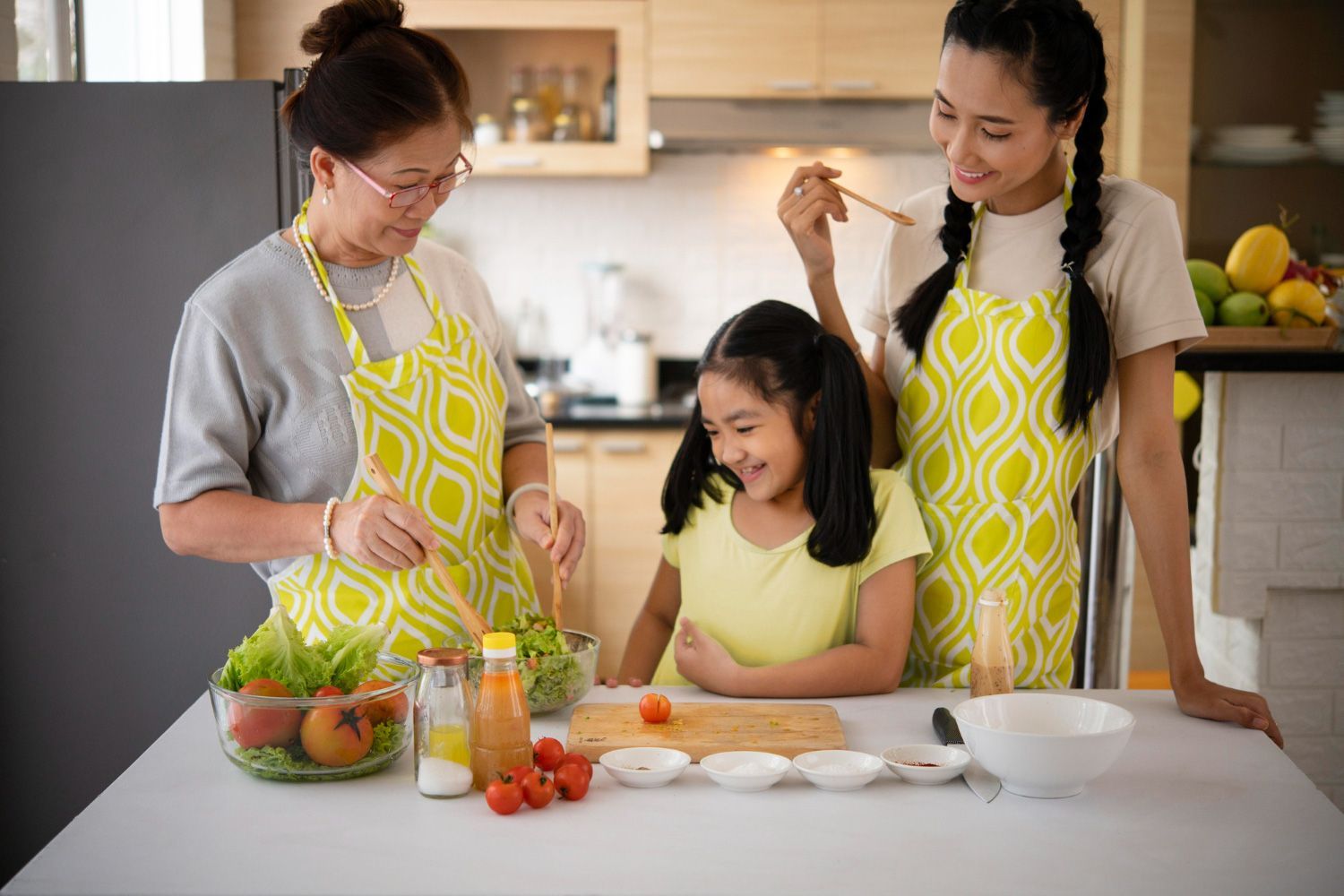 A family is preparing food together in the kitchen.