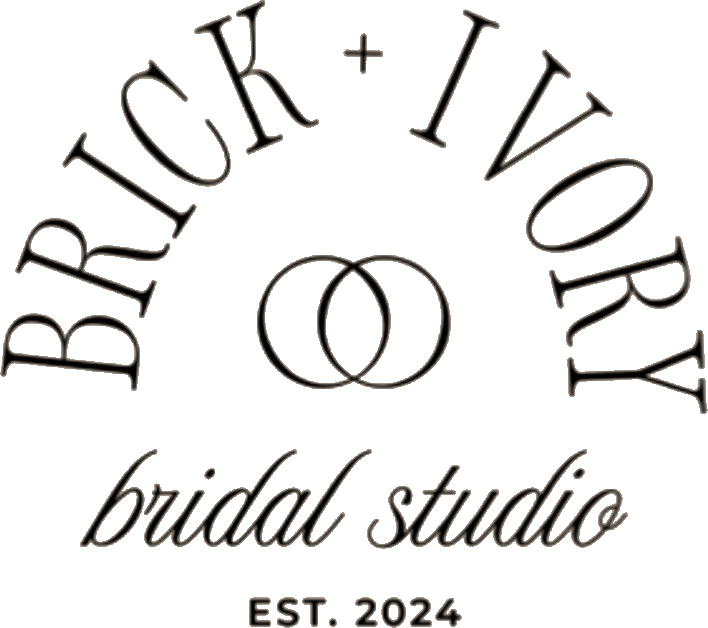 Logo for Brick + Ivory bridal studio, with arched text above two linked rings, and