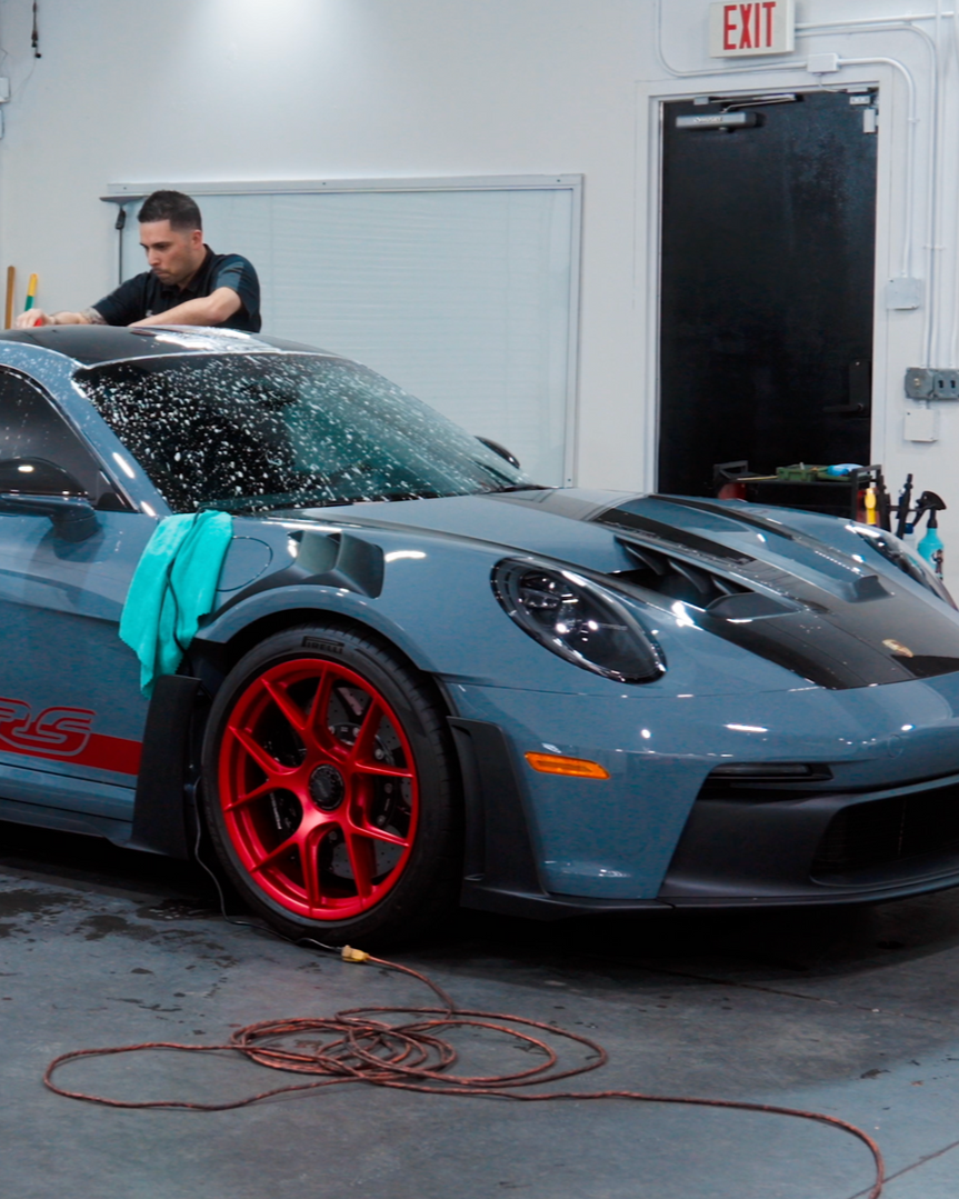A close up of a car wheel with a mercedes logo on it