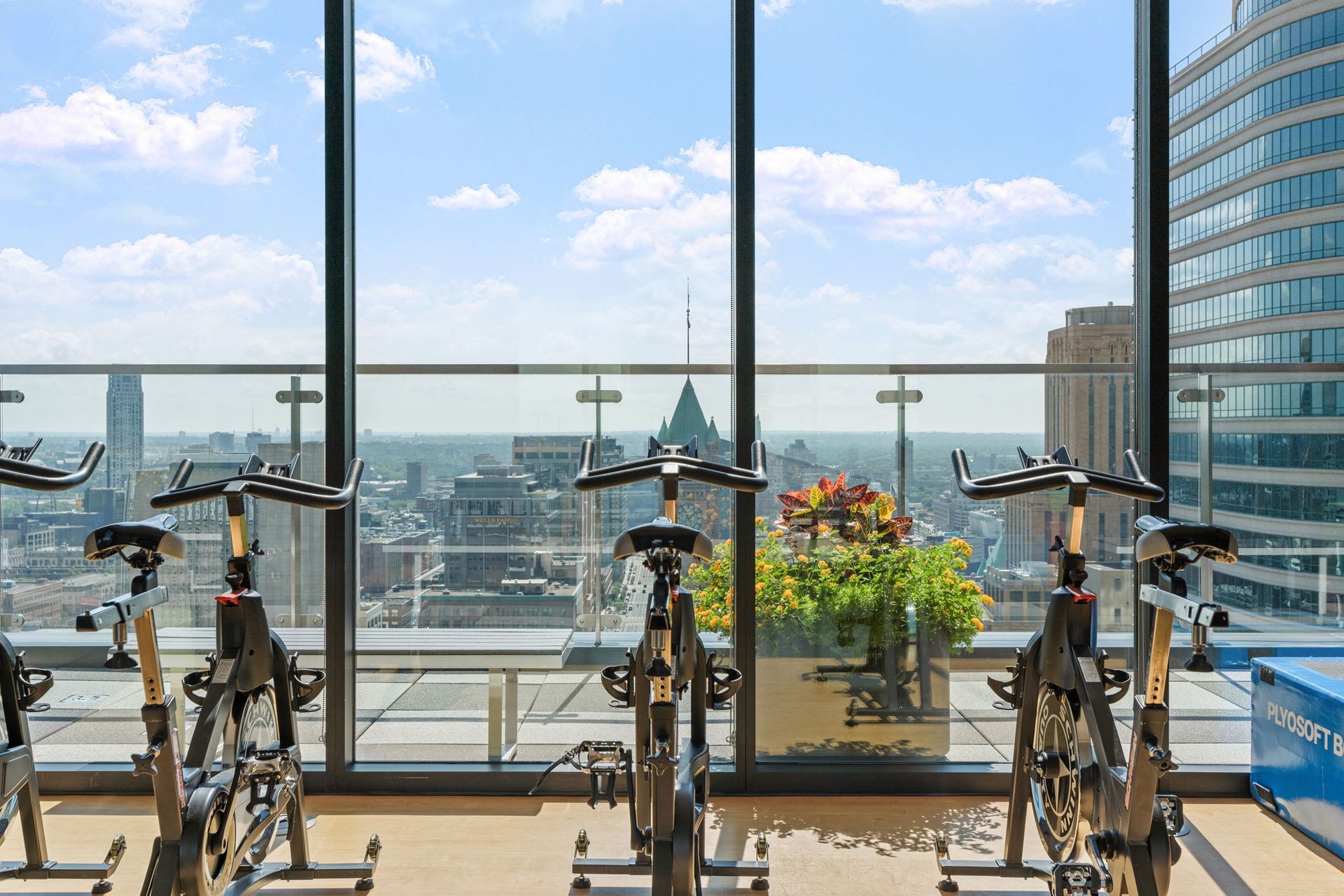 A bicycle is parked in a bicycle rack in a parking garage.