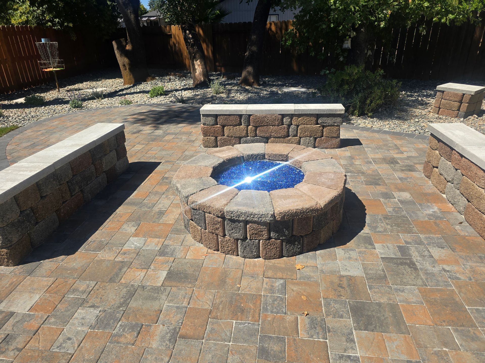 There is a pond in the middle of the garden.