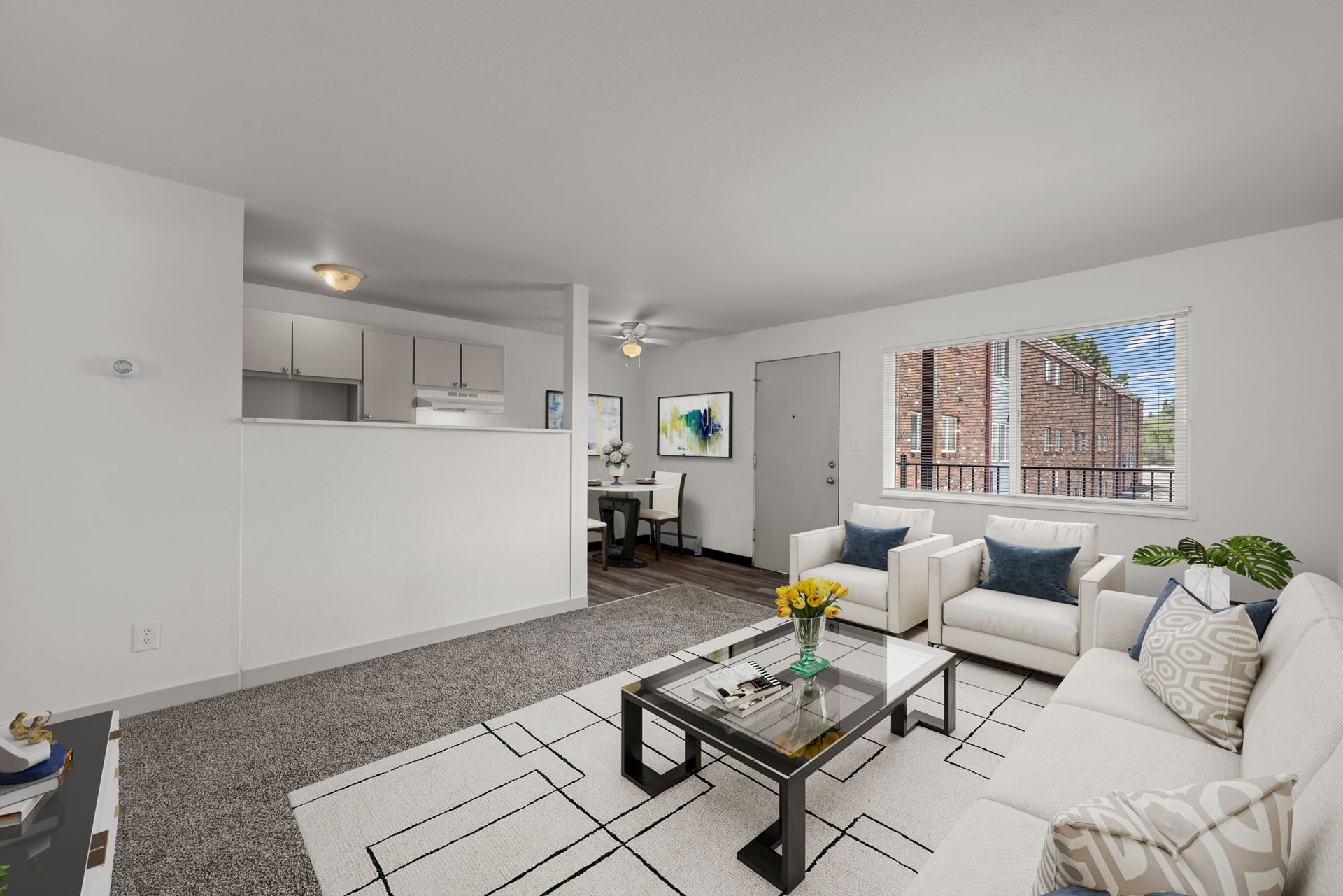 Photo showing a living room with plenty of natural lighting