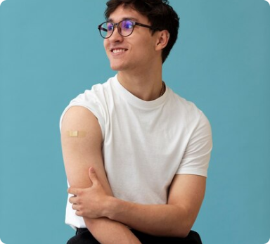 a man wearing glasses and a white shirt has a bandage on his arm .