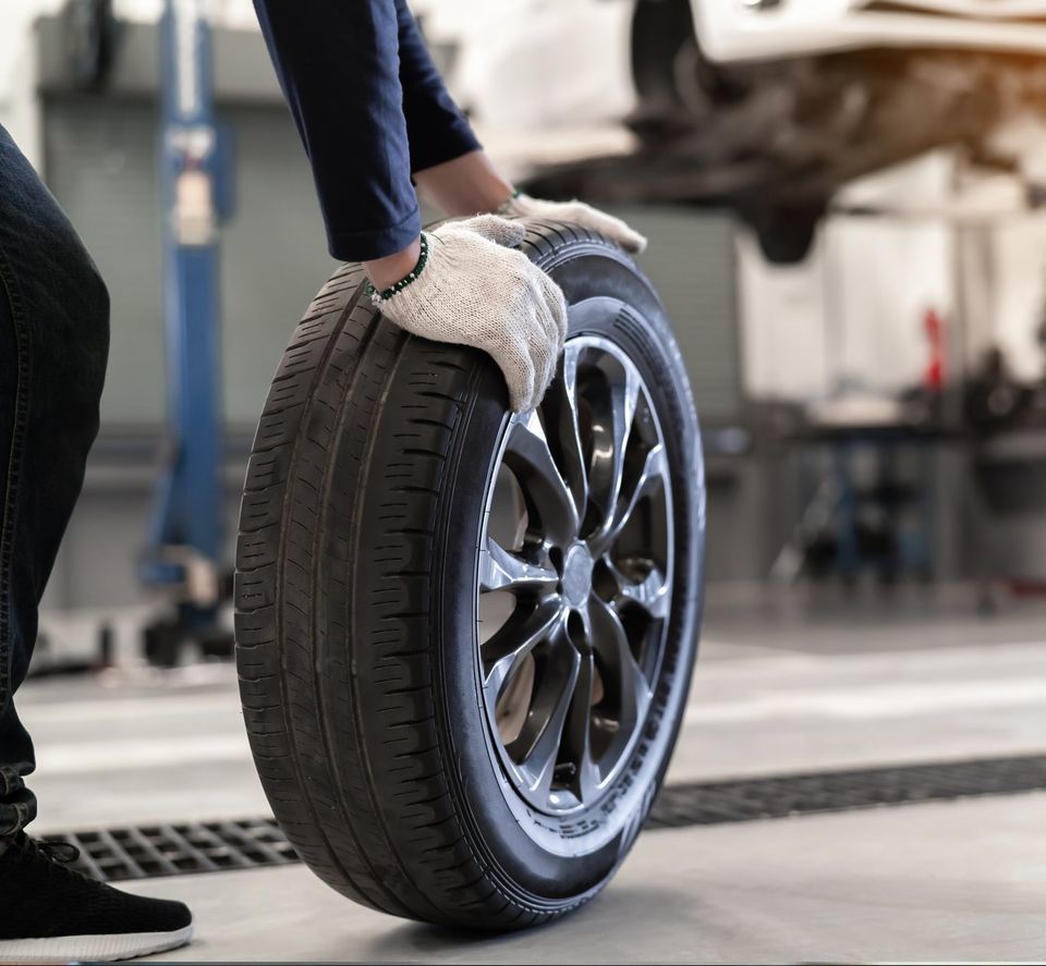 Mechanic Man Change A Wheel Tire — Golden Valley, MN — Boulevard Automotive & Towing