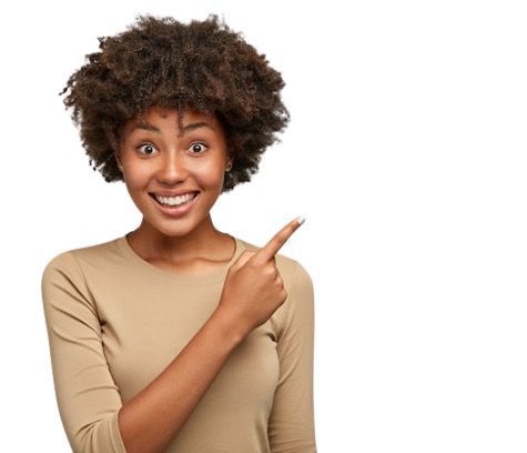 a woman with curly hair is pointing to the side with her finger to customer reviews