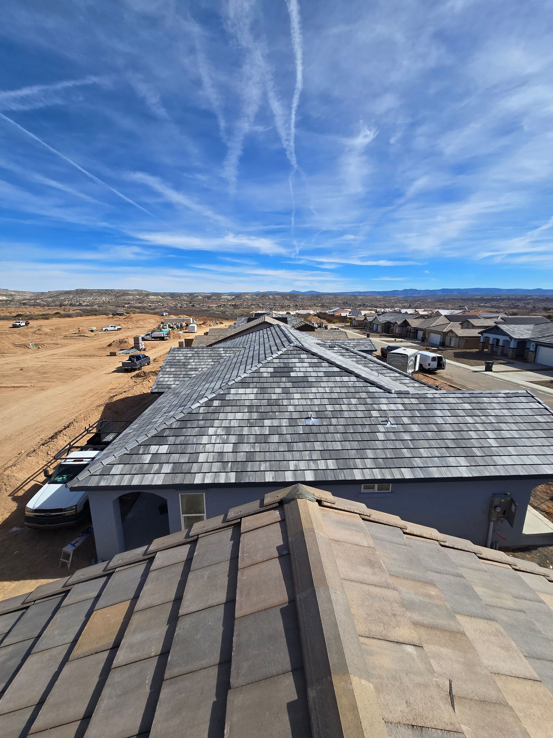 An aerial view of a house with a roof that is being built
