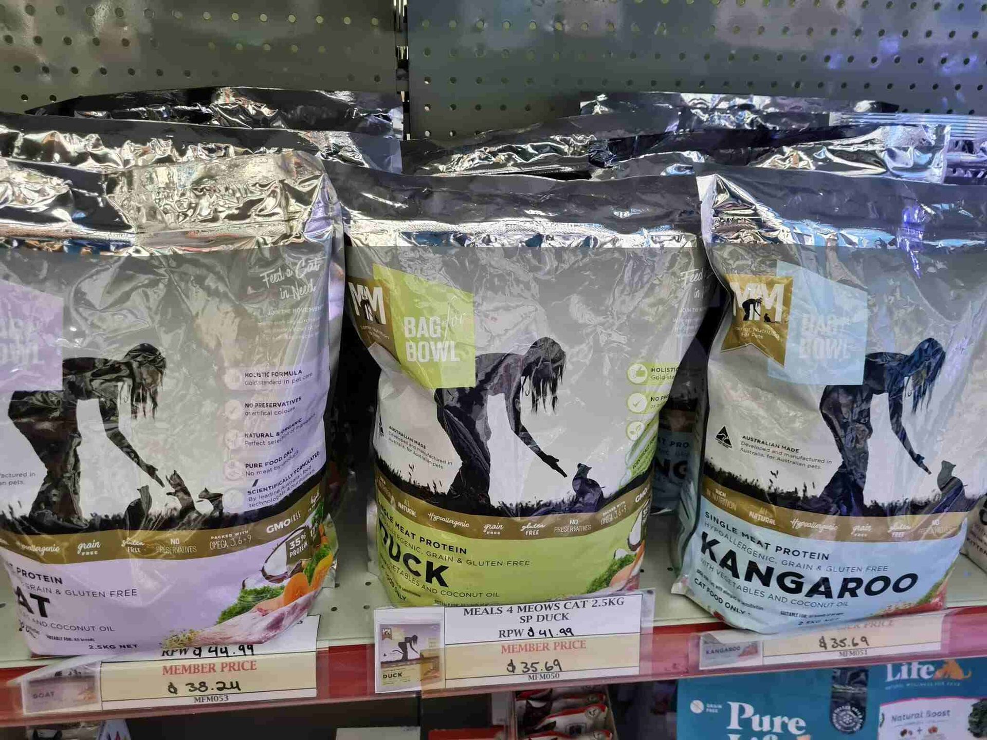 Three Bags of Kangaroo Dog Food Are on a Shelf — Rocky Pet World in Norman Gardens, QLD