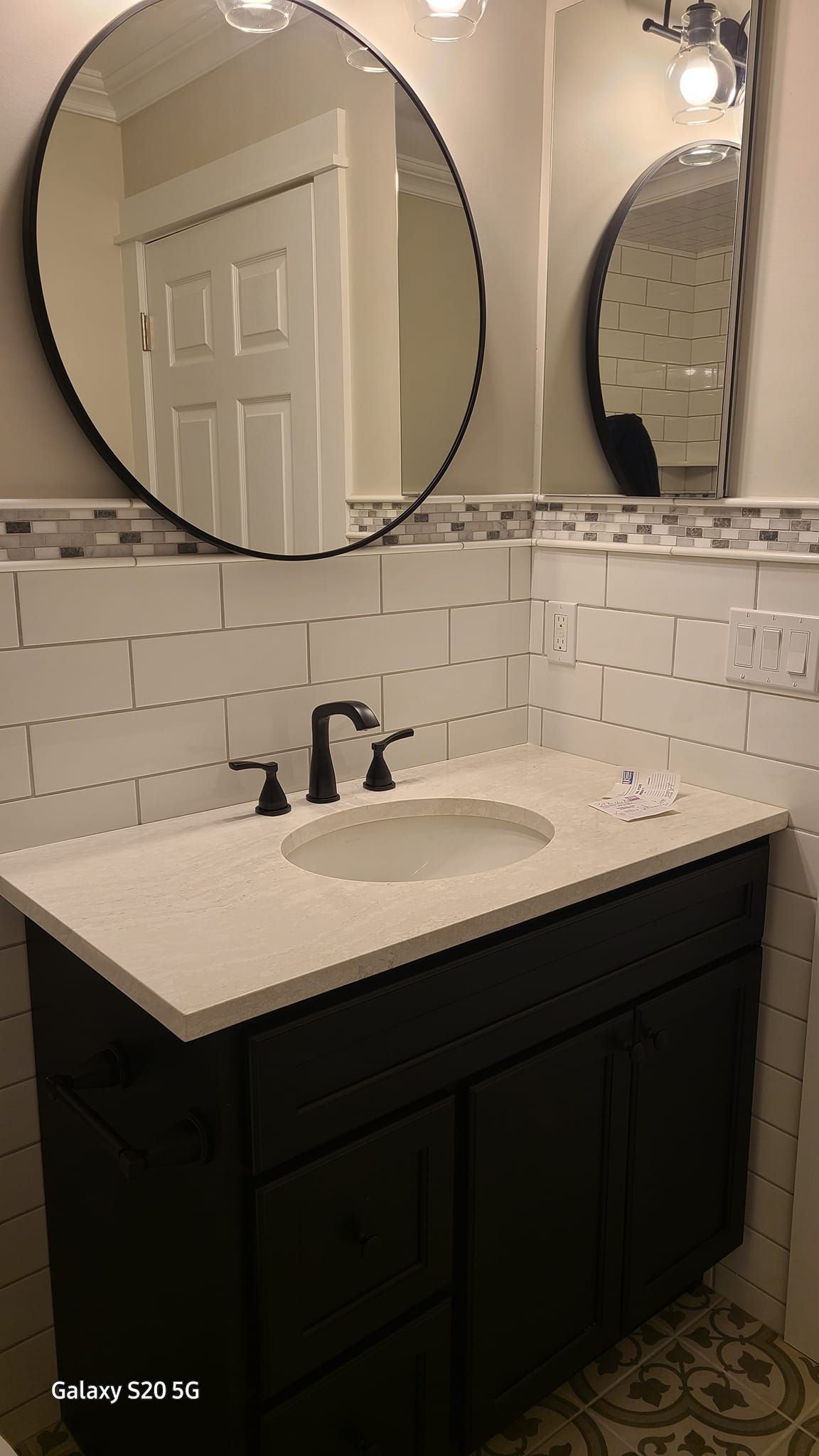 A bathroom with a toilet , shower and window.