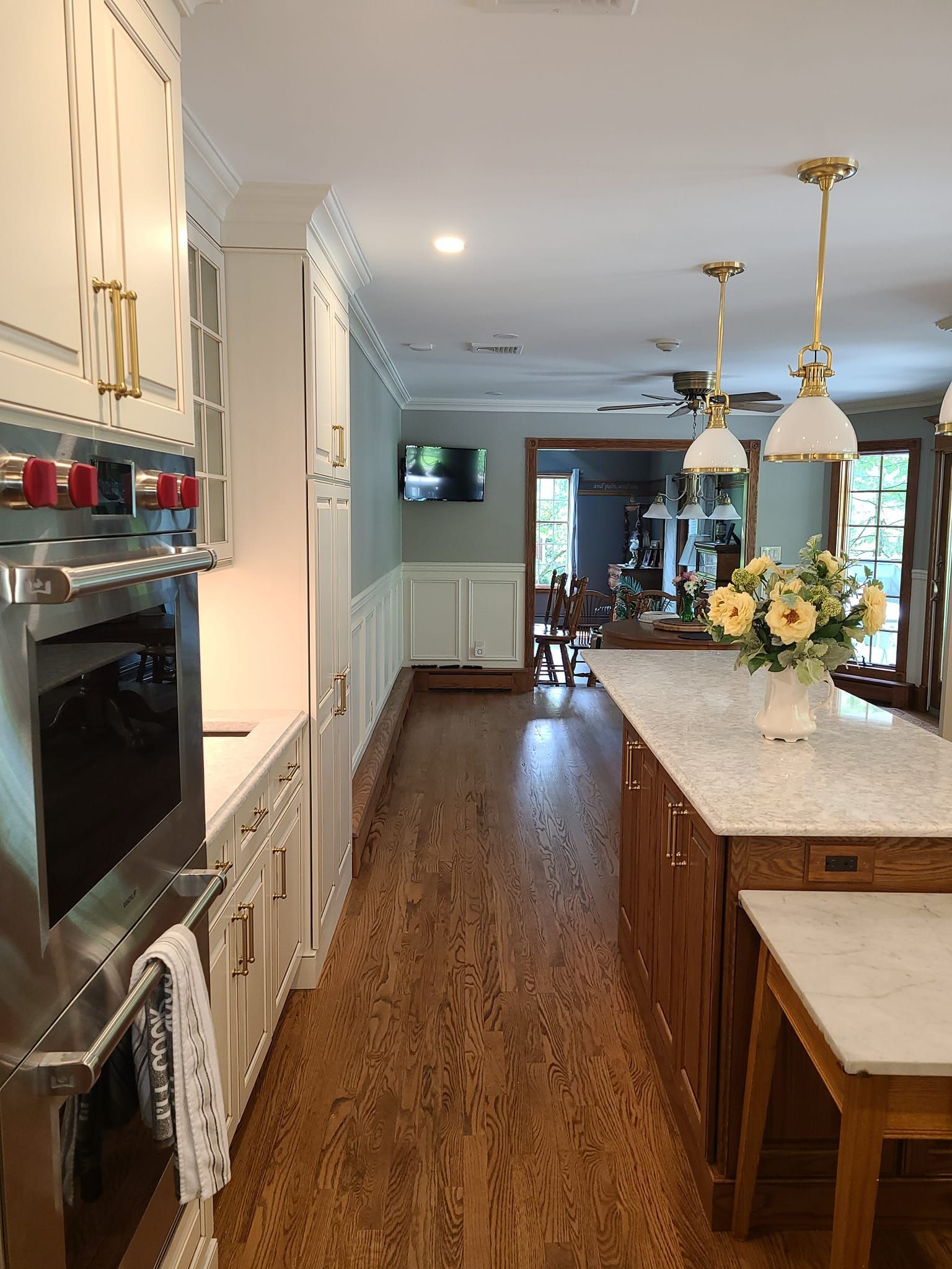 A kitchen with a large island in the middle of it