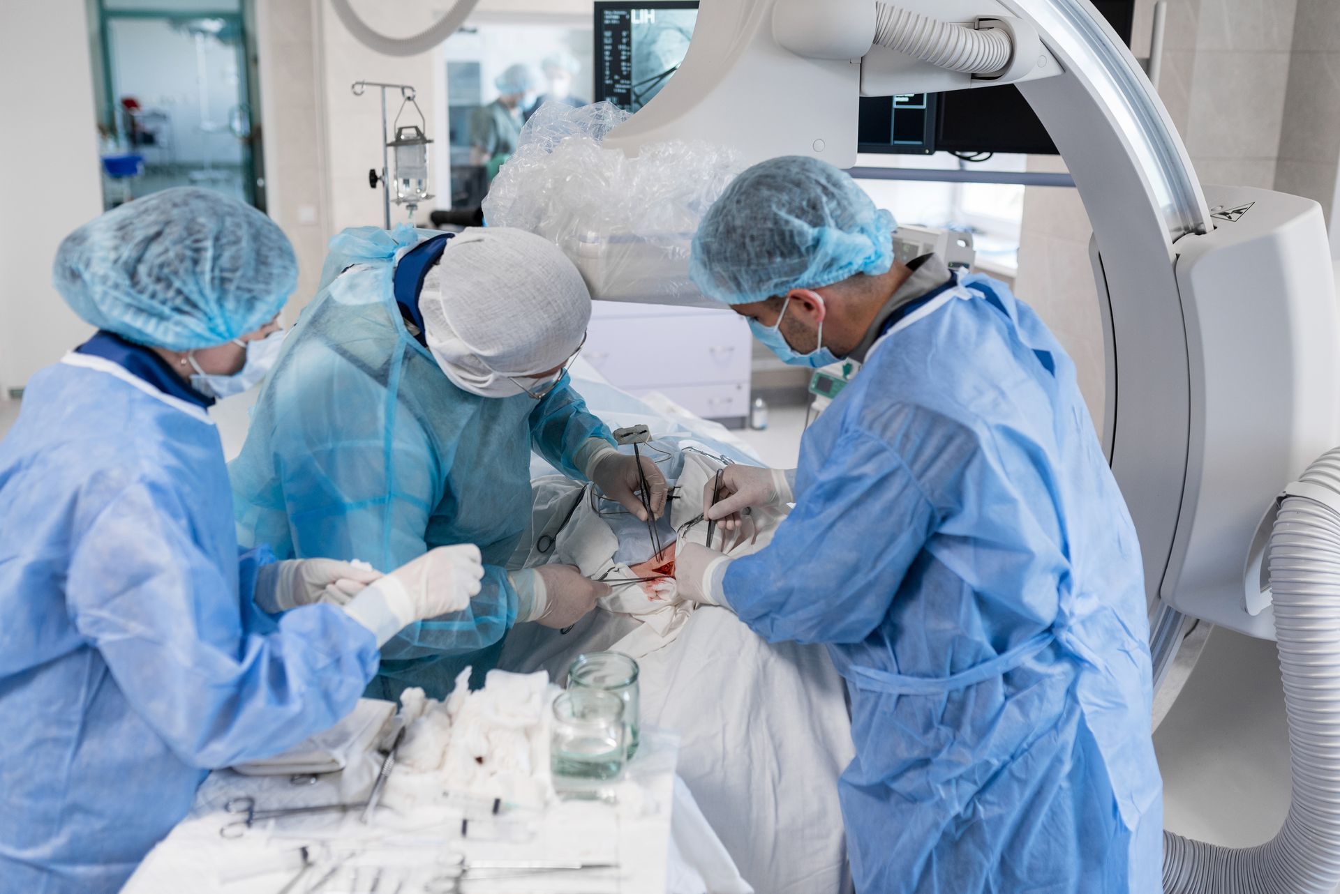 A specialized team performs a heart bypass surgery using advanced medical instruments.