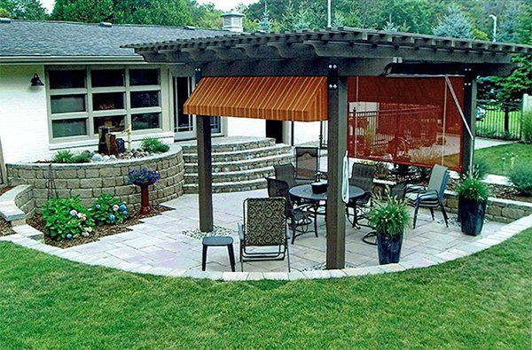 Outdoor Lightning — Landscape Garden Design with Chairs in Midland, MI
