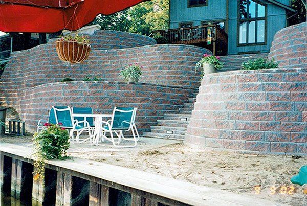 Installation Design Landscape — Chairs and Table in the Stone Landscape in Midland, MI