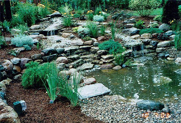 Hardscape — Fish Pond with Landscape in Midland, MI
