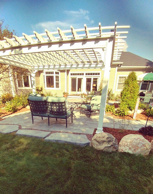 white pergola over patio - Hardscaping in Midland, MI