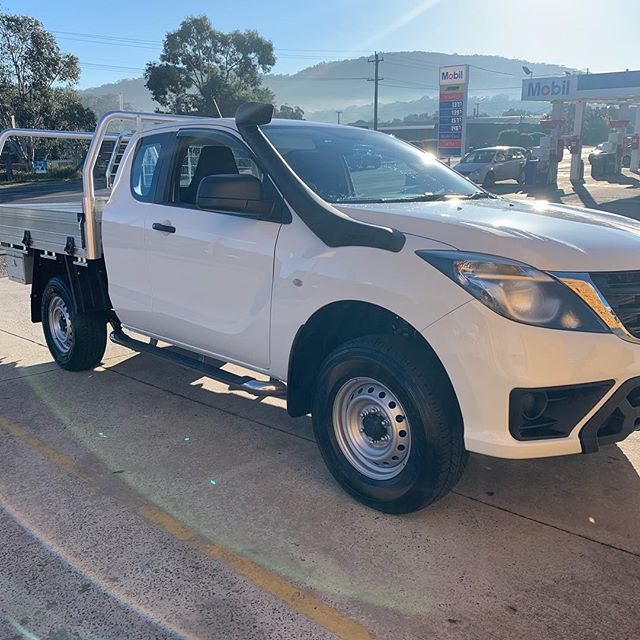 White Brand New Car — Mechanical Services in Moss Cake, NSW