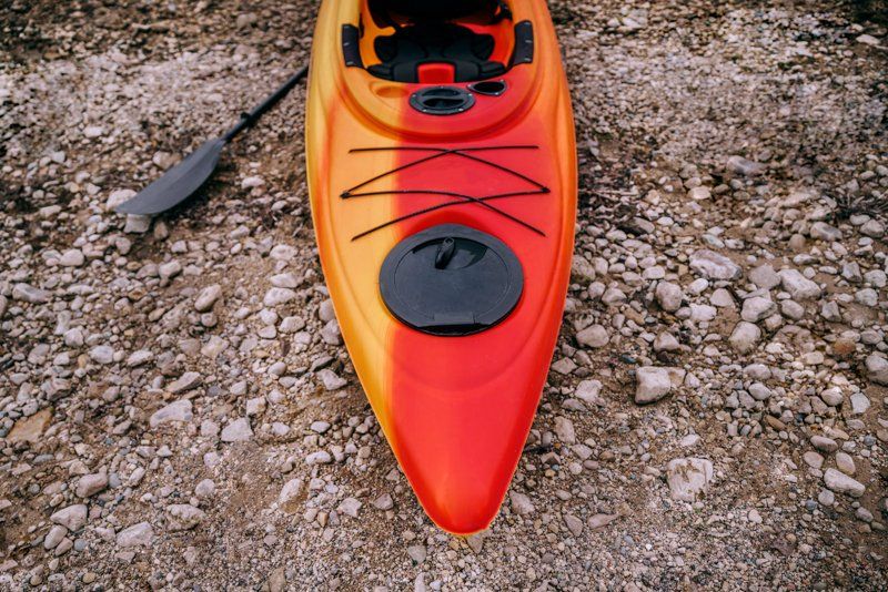 Red and orange single kayak