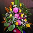 A bouquet of pink and yellow flowers in a pink box — Greenfield Blooms and Gifts In Wanguri, NT