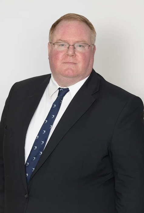 portrait of Brendan J. Dooley, Esq.