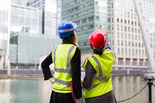 Women engineers are working on a construction site