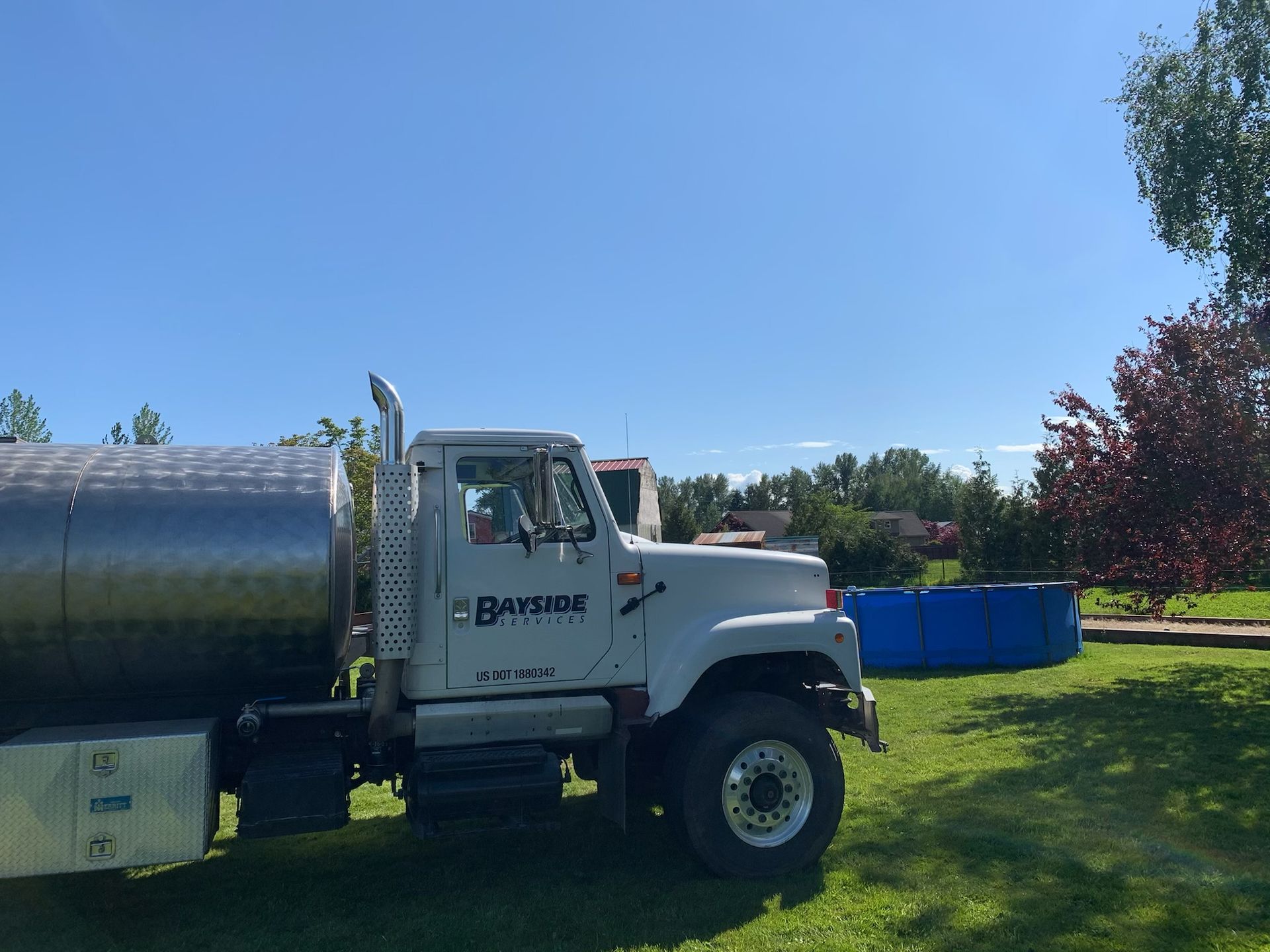 Industrial Vacuuming — Truck On Road Construction Site in Everson, WA