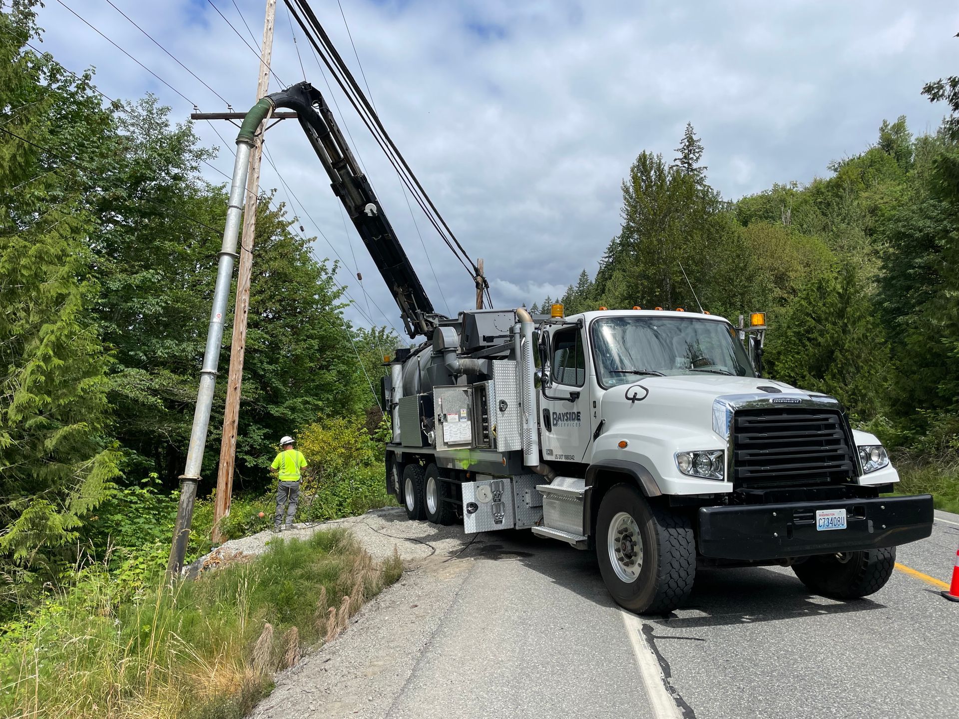 Pavement Sweeping — Bayside Service Truck Side View in Everson, WA