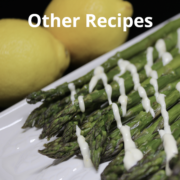 An assortment of unique and delightful recipes, including Nutella & Bailey's Martini, Basil Pesto, Homemade Fettuccine, Citrus Aioli, and Garlic & Herb Butter, each dish beautifully presented to showcase its flavor and appeal.