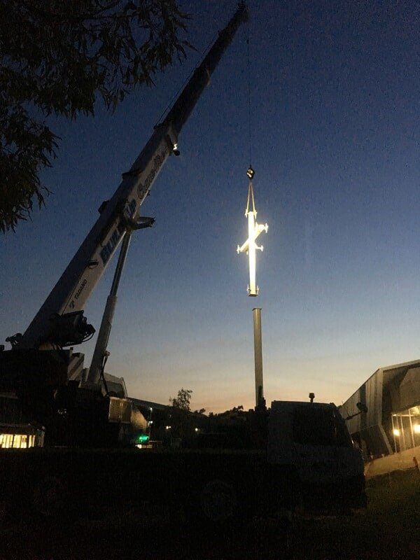 Crane lifting church cross — Build Up Crane Hire in Casuarina, NT
