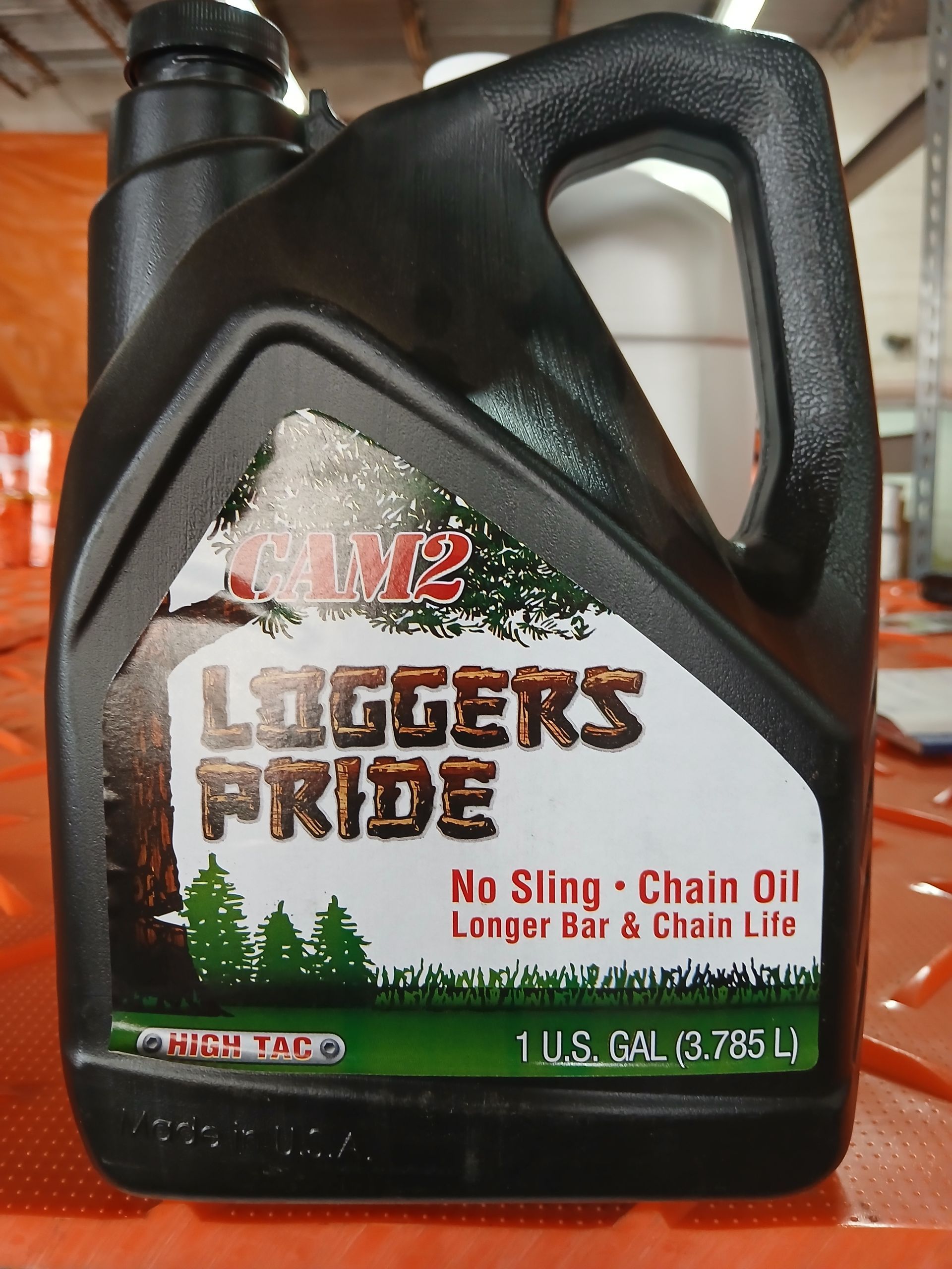 Black container of Logger's Pride chain oil, with label and handle. 1 US gallon/3.785 L.