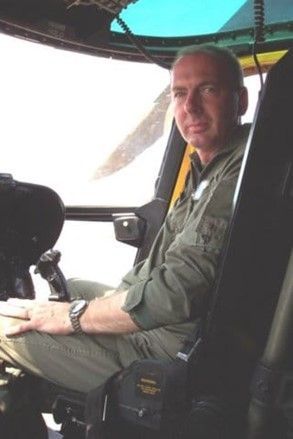 A Man Is Sitting in The Cockpit of An Airplane