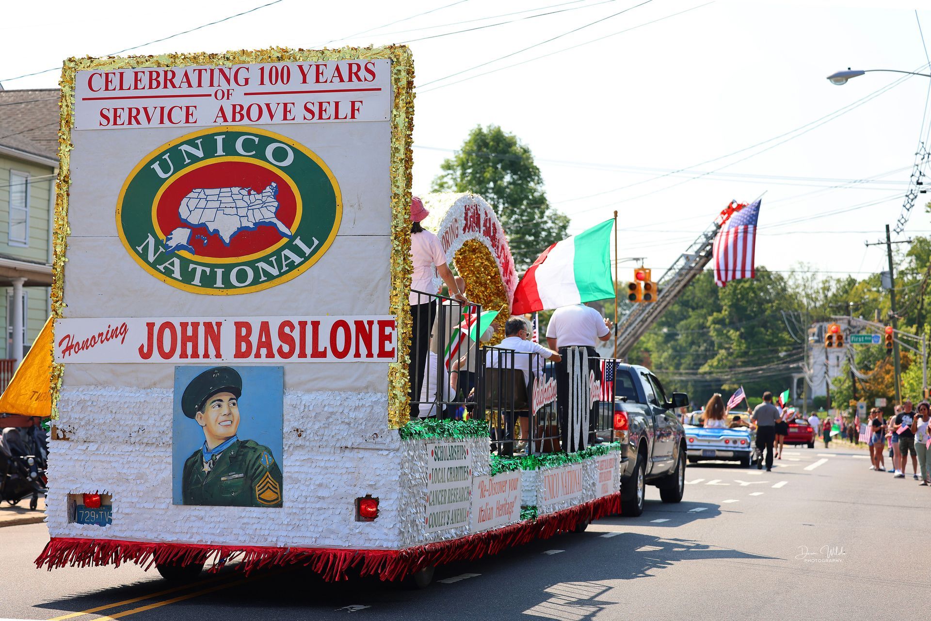 A float with the name John Basilone on it