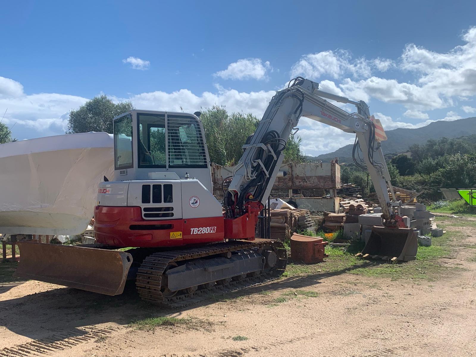 escavatore cingolato