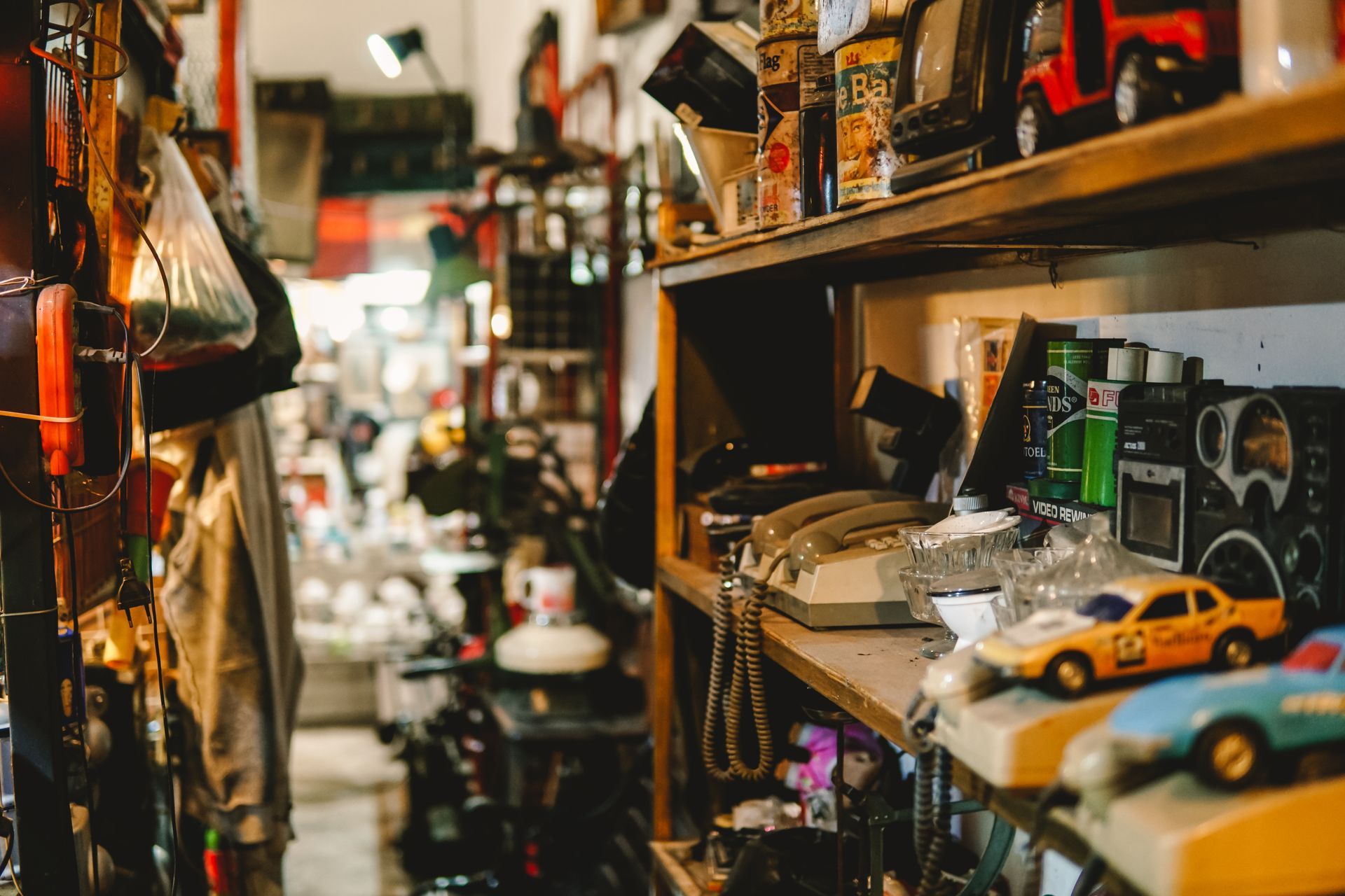 There are a lot of toys on the shelves in this store.