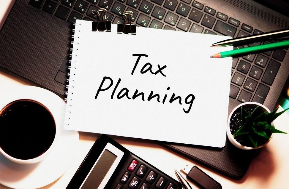 A notepad with the words tax planning written on it