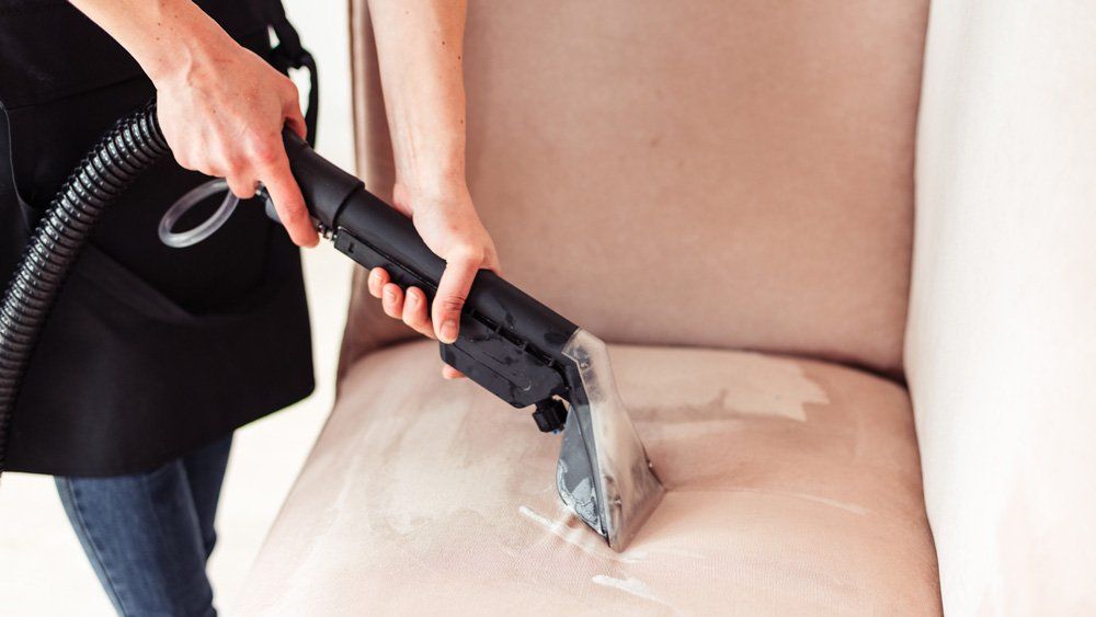 Vacuuming The Sofa — Valley, NY — Classic Carpet and Upholstery Cleaning