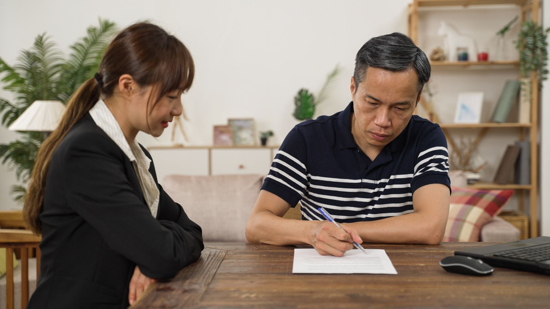 Florida notary assisting with Power of Attorney signing in a care facility.