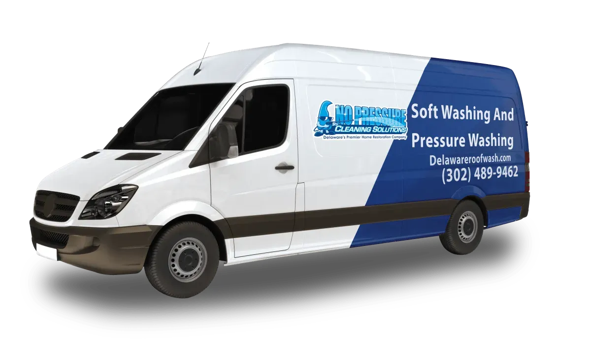 A white van with a blue stripe on the side that says soft washing and pressure washing.