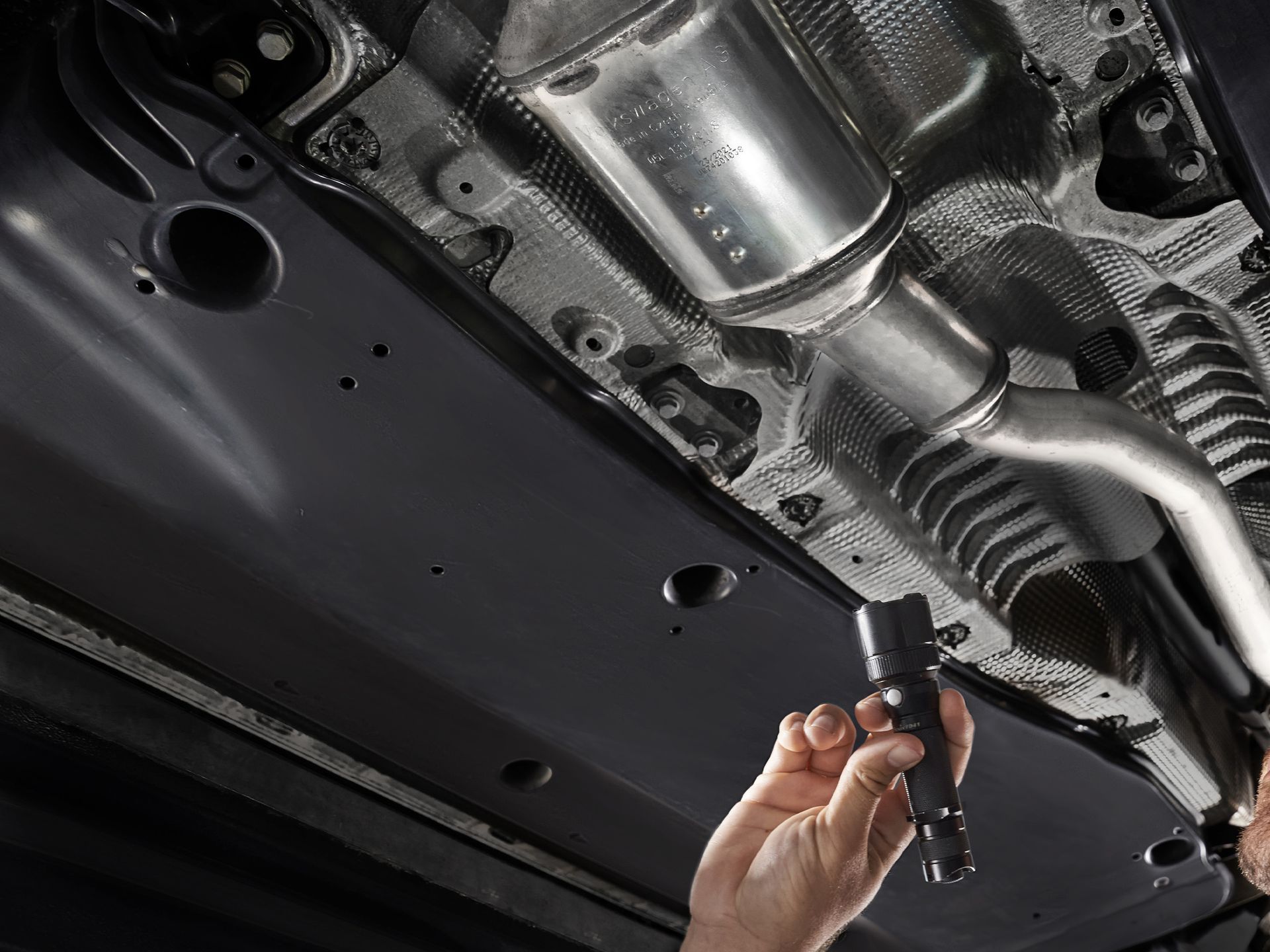 A Close Up of an exhaust With A Filter Attached To It — Ballina Rego & Mechanical Centre In Ballina, NSW