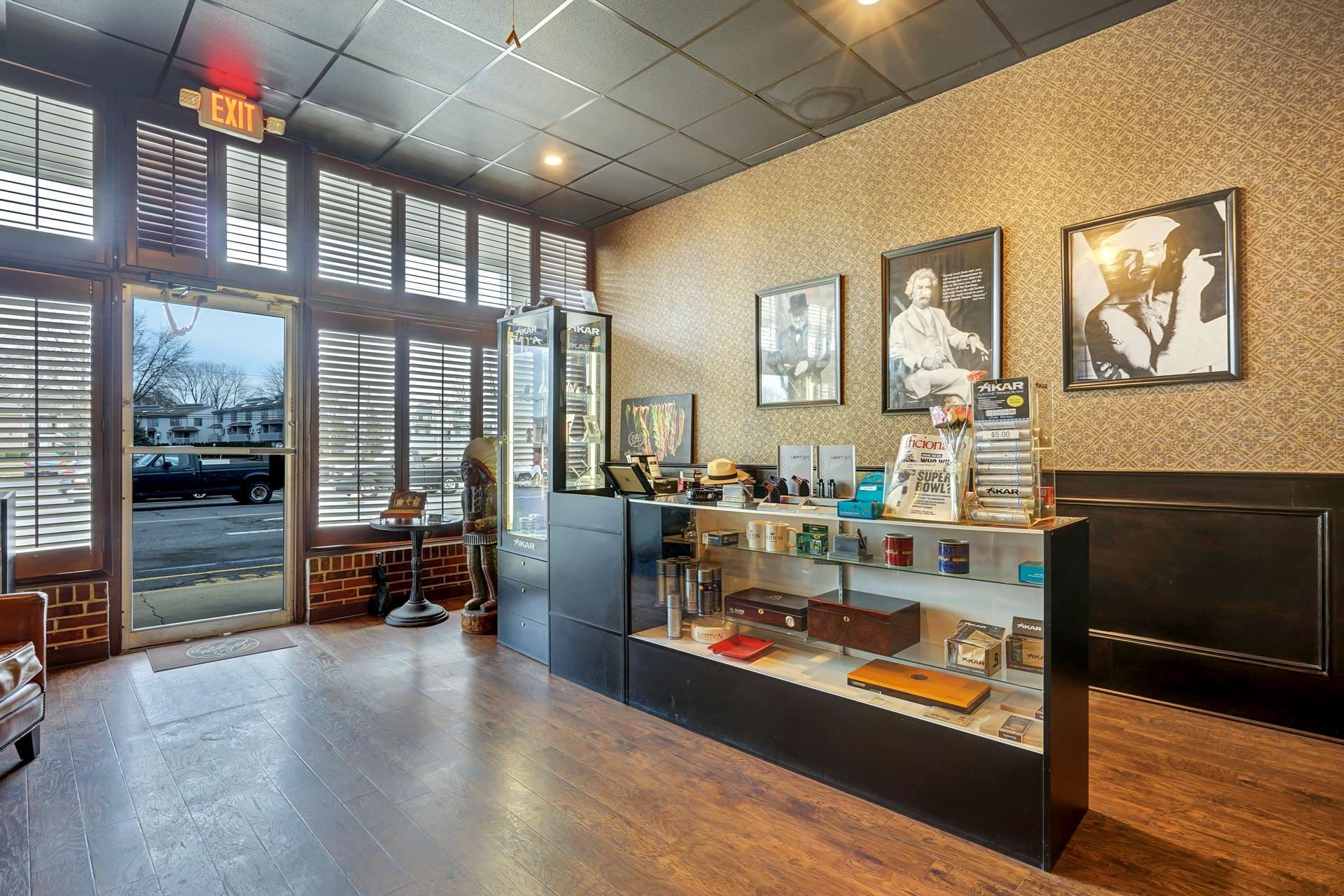 A large room with a lot of windows and a display case